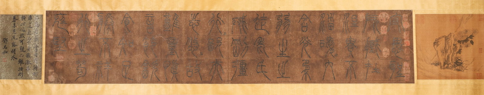 HUANG TINGJIAN, SEAL SCRIPT "NOBLE SPIRIT", NORTHERN SONG DYNASTY, HANDSCROLL WITH INSCRIPTION BY: Paper Texture, 92.52 inches x 14.17 inches (235.0 cm x 36.0 cm)Executed in taut "iron-thread” seal script, this handscroll exemplifies Northern Song literati seal art. Accompanied by Deng Shiru�
