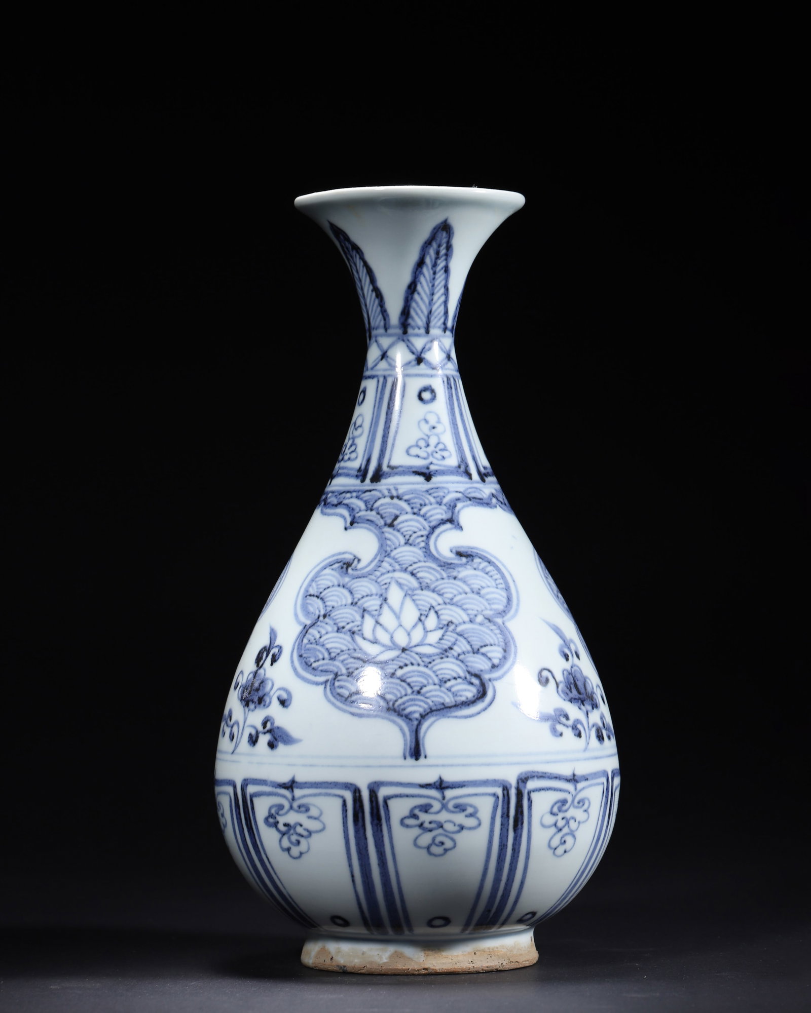 YUAN DYNASTY BLUE AND WHITE YUHUCHUN VASE WITH SEA WATER AND LOTUS MEDALLION: 5.51" x 11.02" inches (14.0 cm x 28.0 cm)A masterpiece of Yuan Dynasty blue and white porcelain, featuring a lustrous glaze, vibrant cobalt-blue sea water patterns and lotus medallions, and an elegant