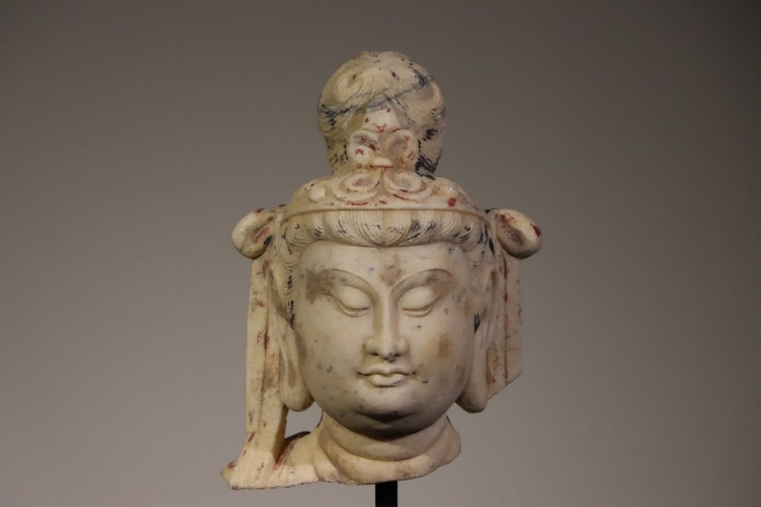 A FINE POLYCHROMED WHITE MARBLE HEAD OF GUANYIN, TANG DYNASTY, 7TH–8TH CENTURY AD (1 of 7)