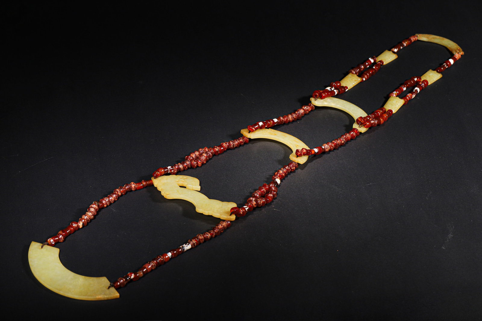 WARRING STATES TO HAN DYNASTY JADE AND AGATE PENDANT SET: Length (l): 79.0Cm (31.1In); Width (w): 14.0Cm (5.51In); Weight (wt): 490.0G (1.08Lb)An aristocratic ritual artifact from the warring states to han dynasty, composed of jade huang, jade heng, and agat