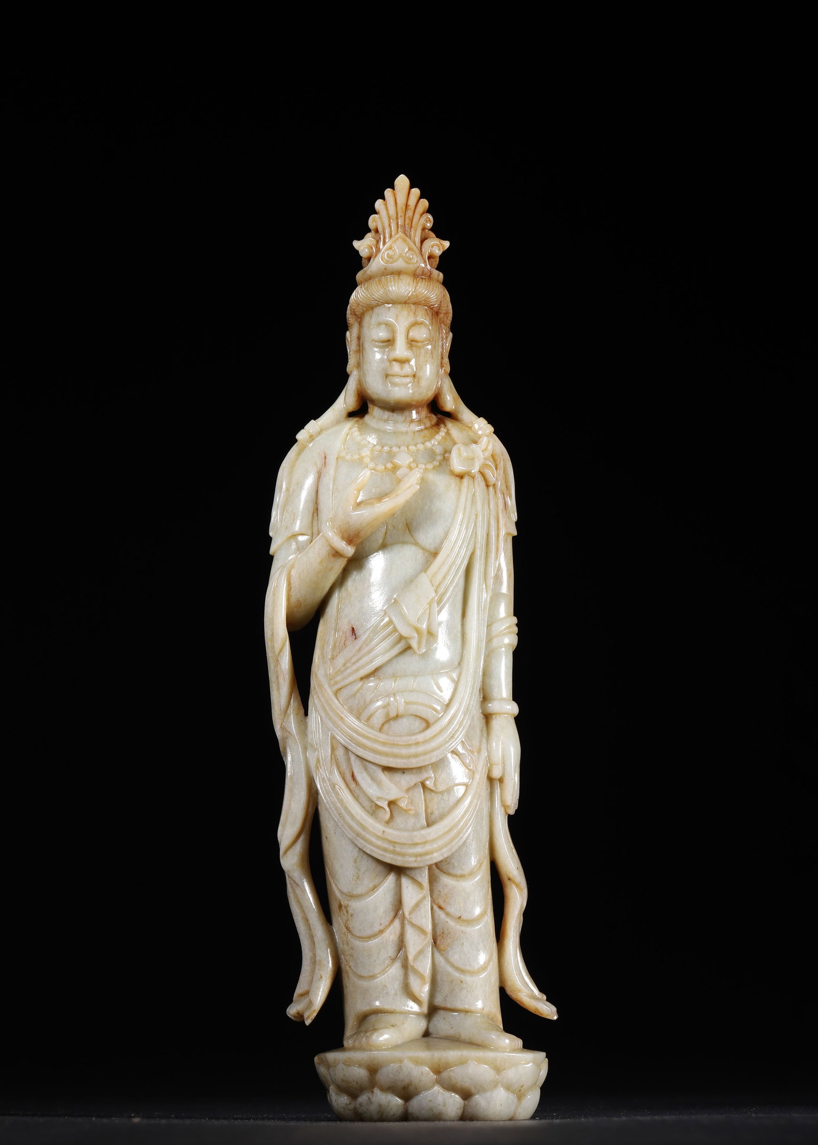 QING DYNASTY PALE GREEN JADE CARVED STANDING GUANYIN STATUE: 2.17in x 1.42in x 8.27in (5.5cm x 3.6cm x 21.0cm) 0.531lbs (241g)A fine Qing Dynasty pale green jade standing Guanyin statue, carved with serene expression, flowing robes, and intricate headdress. The