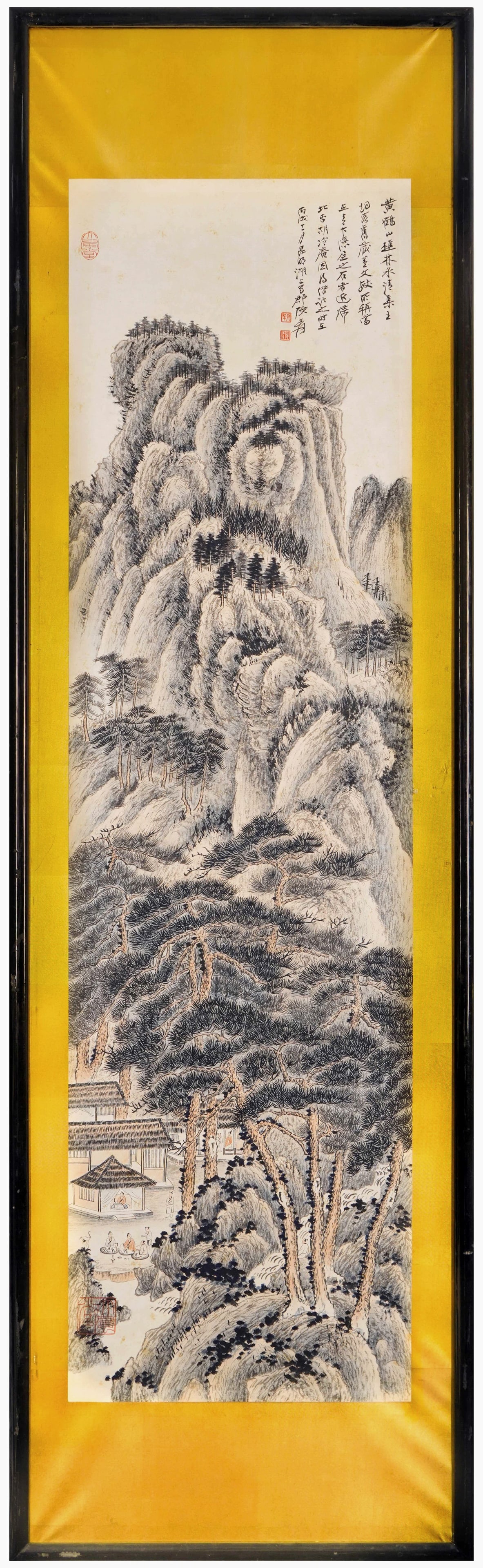 ZHANG DAQIAN (1899-1983) LANDSCAPE IN THE STYLE OF WANG MENG, FRAMED INK AND COLOR ON PAPER, DATED: 53.1in x 10.6in (135.0cm x 27.0cm)A refined archaistic landscape by Zhang Daqian, painted in 1946. Dense brushwork depicts layered mountains and scholars gathering, in the style of Yuan master Wang Me
