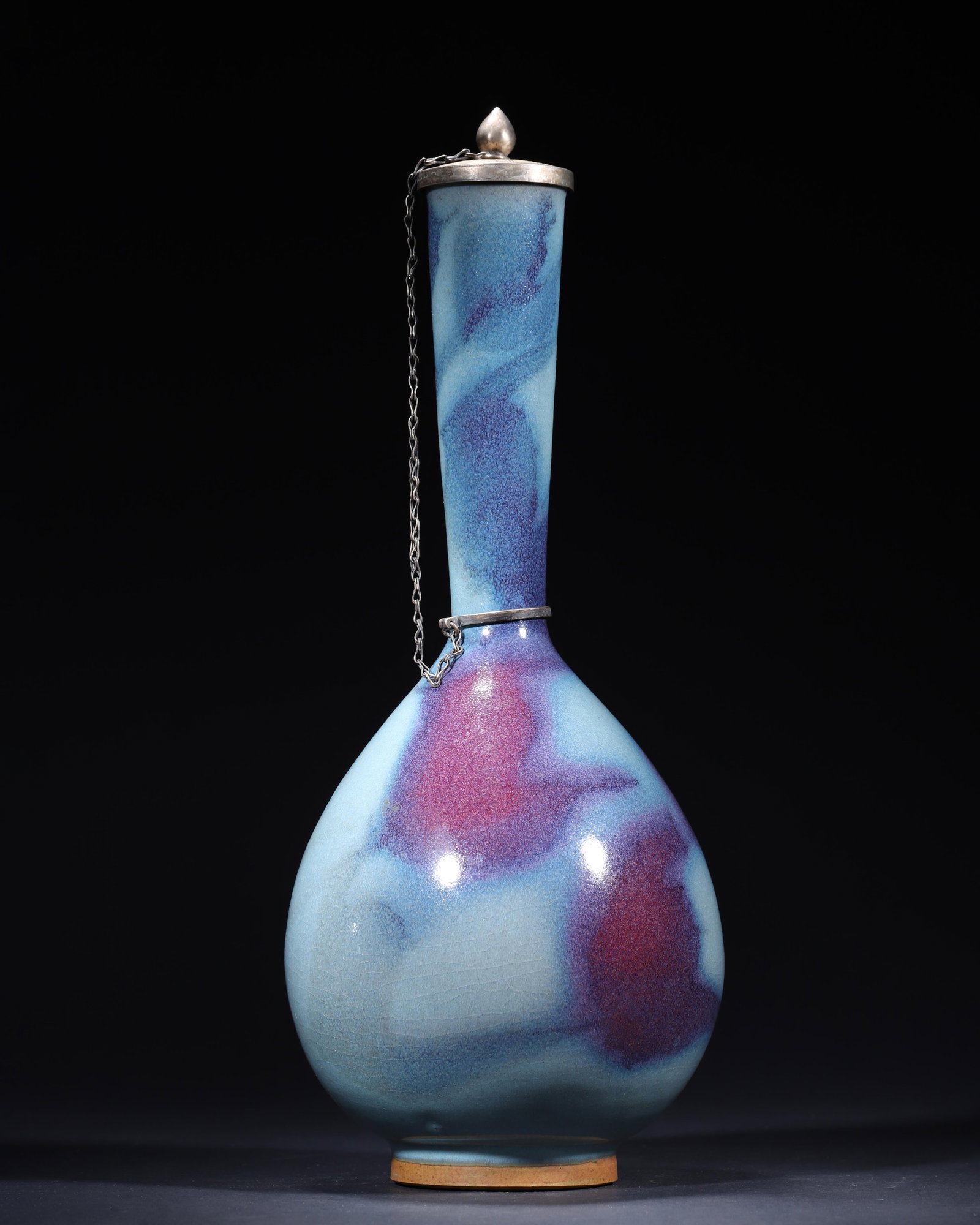 SONG DYNASTY JUN KILN SKY-BLUE GLAZED LONG-NECKED GALLBLADDER VASE WITH ROSE-PURPLE FLAMBE (WITH: 6.30in x 16.54in (16.0cm x 42.0cm)A fine Song Dynasty Jun kiln long-necked vase, covered in a milky sky-blue glaze with swirling rose-purple flambe clouds. Accompanied by a later gilded silver cover i
