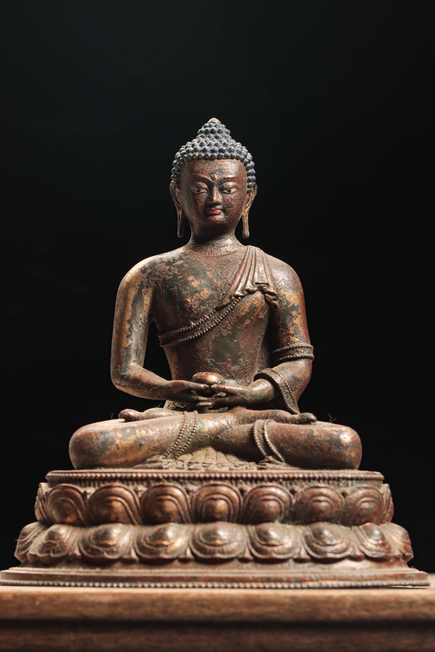 A GILT-BRONZE SEATED FIGURE OF SHAKYAMUNI BUDDHA, QING DYNASTY, TIBETAN STYLE (1 of 7)