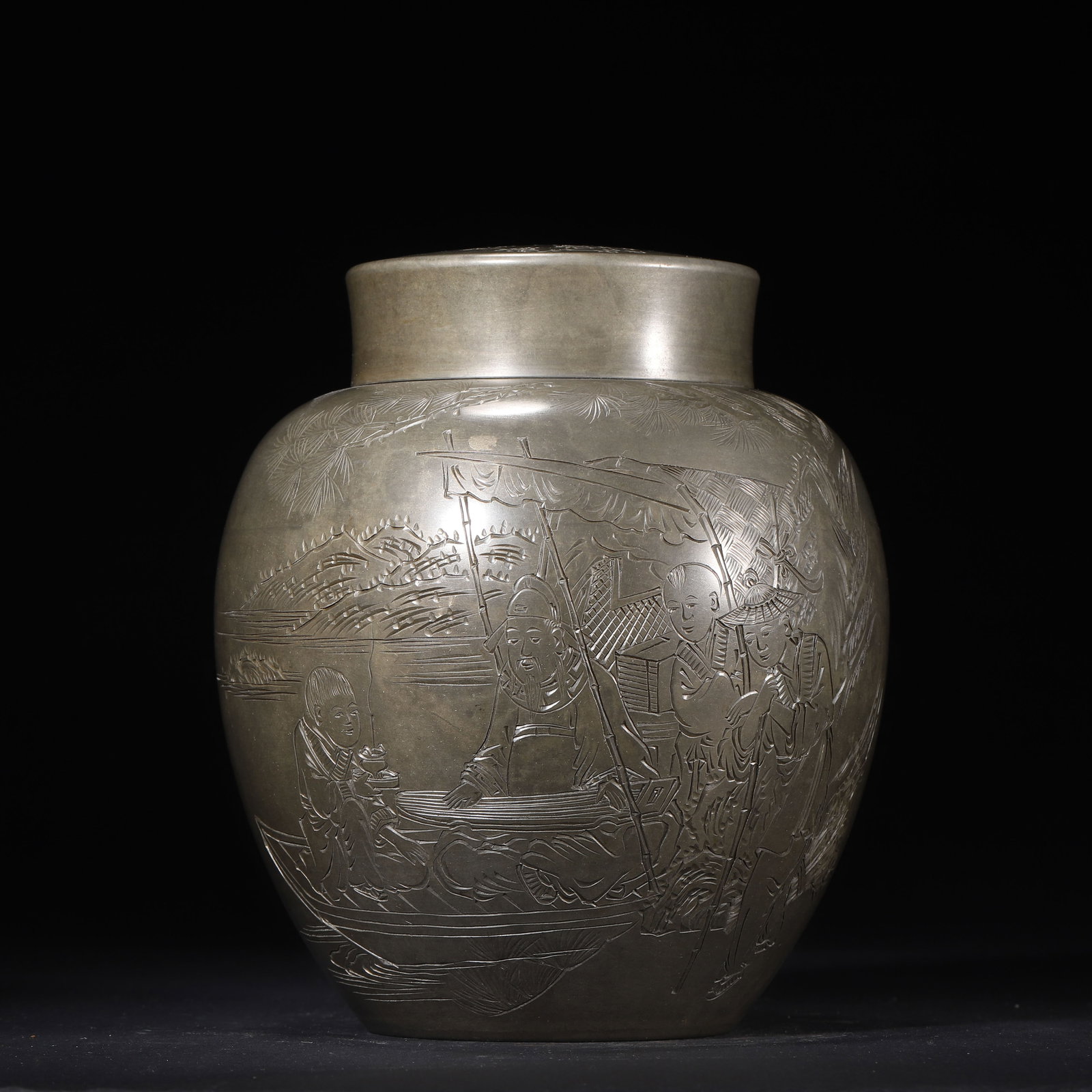 LATE QING PERIOD, A TIN TEA CADDY WITH FIGURE AND POEM INSCRIPTION, MARKED 'YI DAO LAO REN': 5.91" x 7.09" (15.0cm x 18.0cm) 2.687lb (1219g)This fine tin tea caddy, crafted by 'Yi Dao Lao Ren', features a robust form, double lid, and intricate carvings of a literati gathering and calligraphy.