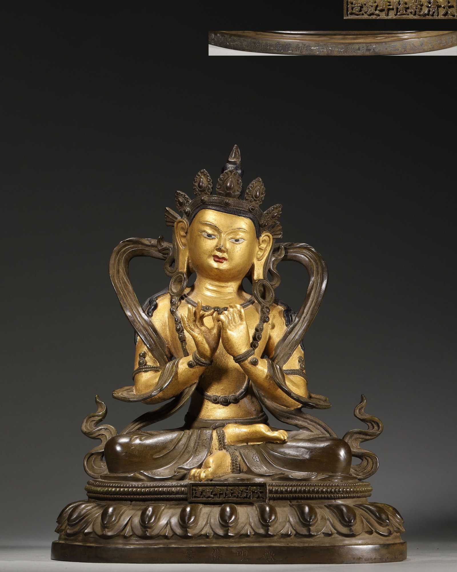 IMPERIAL QIANLONG PERIOD, QING DYNASTY GILT-BRONZE SEATED STATUE OF GAWGYI BUDDHA MOTHER (WITH: 9.06" x 6.3" x 11.02" (23cm x 16cm x 28cm) 11.07lb (5023g)An imperial Qianlong-period gilt-bronze seated Gawgyi Buddha Mother, with a serene expression and flowing scarves. Bearing dated Qianlong insc