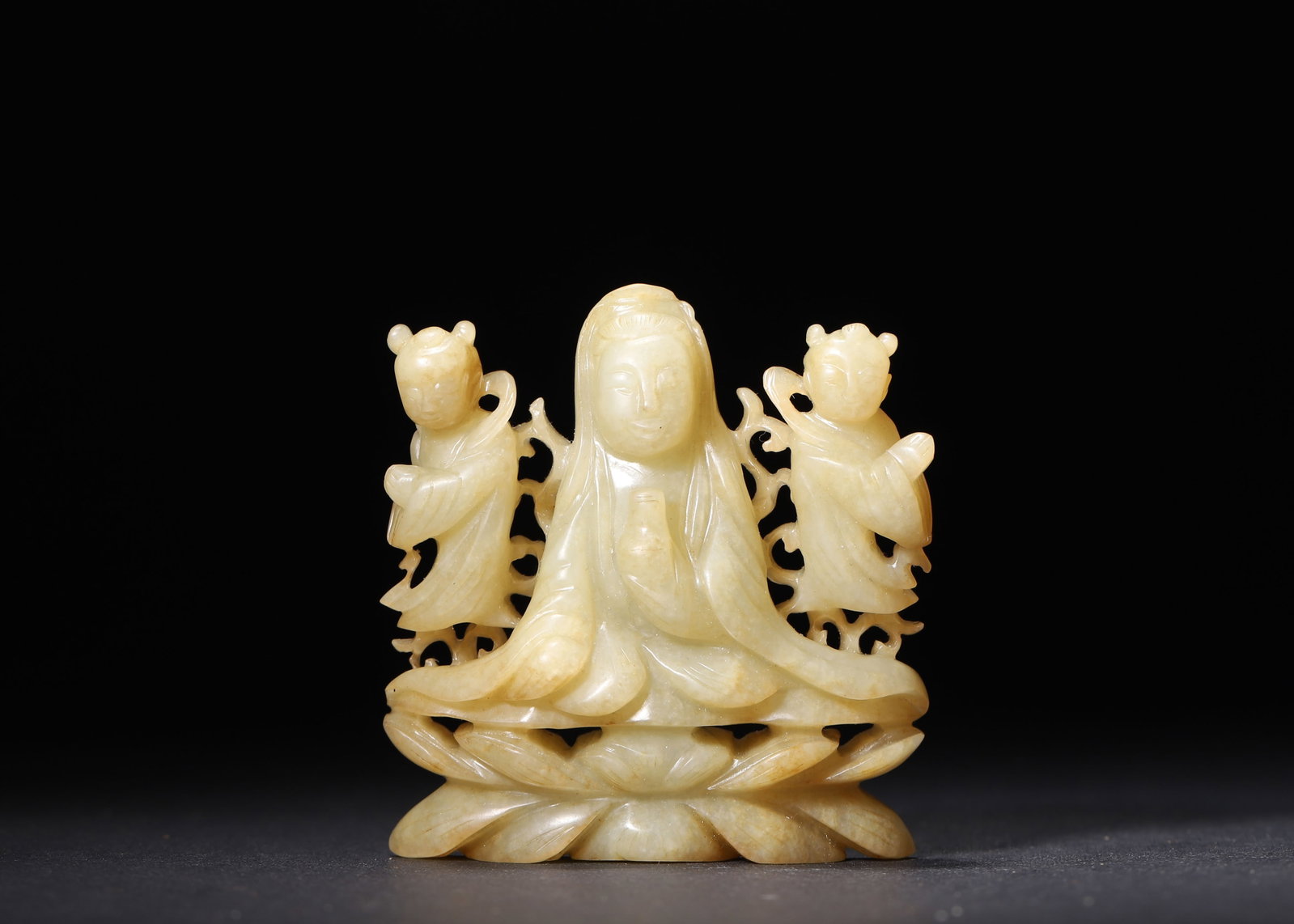 QING DYNASTY YELLOW JADE OPENWORK CARVING OF GUANYIN WITH ATTENDANTS (1 of 6)