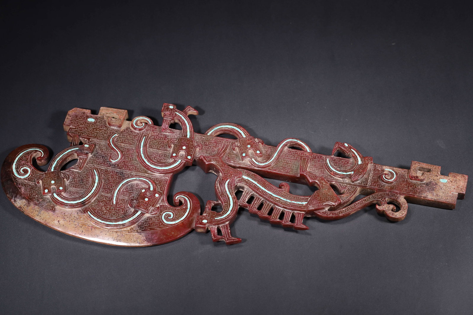 HAN DYNASTY HETIAN JADE YUE AXE WITH CINNABAR PATINA, TURQUOISE INLAY AND DRAGON-PHOENIX MOTIFS (1 of 8)