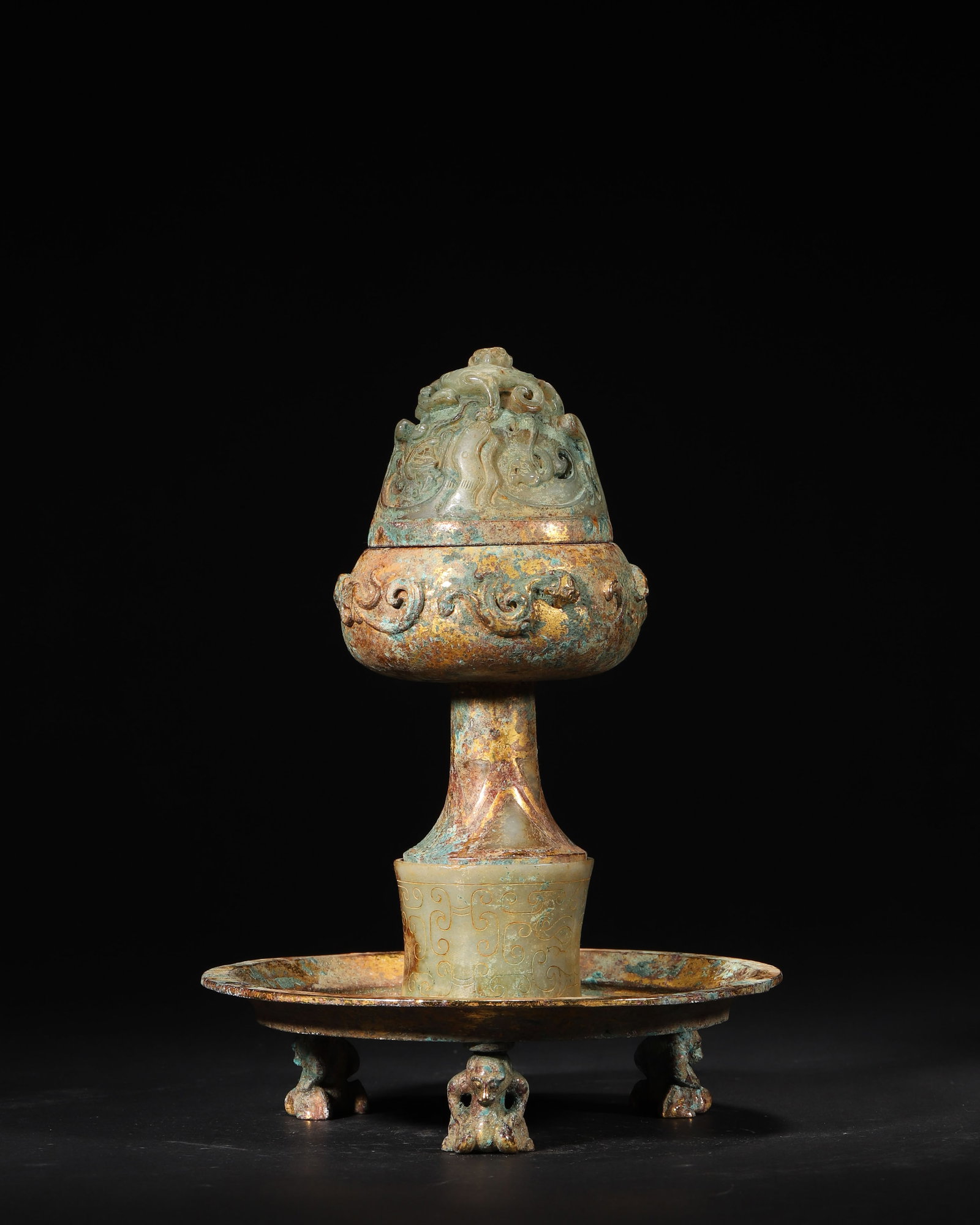 HAN DYNASTY GILT-BRONZE BOSHAN CENSER WITH JADE INLAY AND CHILONG DRAGON KNOB, WITH MATCHING TRAY: 5.91in x 7.87in (15.0cm x 20.0cm), 2.754lb (1249.0g)A Han Dynasty gilt-bronze Boshan censer with jade inlay and openwork Chilong dragon lid, paired with a beast-footed tray. It showcases exquisite Han