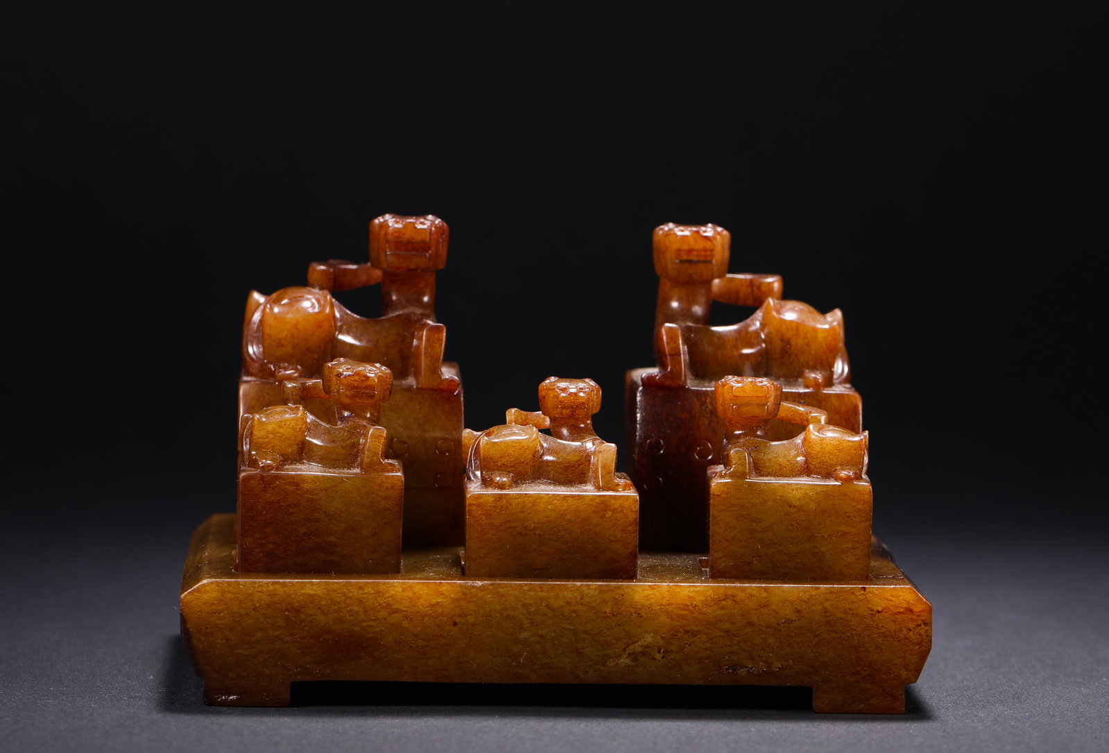 Hetian Yellow Jade, Stacked Seals, Han Dynasty: H:7.6cm(2.99in) W:12.4cm(4.88in) Weight:944g(2.08lb)This set of stacked seals is a masterpiece of Han Dynasty ancient jade craftsmanship. Carved from top-quality Hetian yellow jade, it is calcified