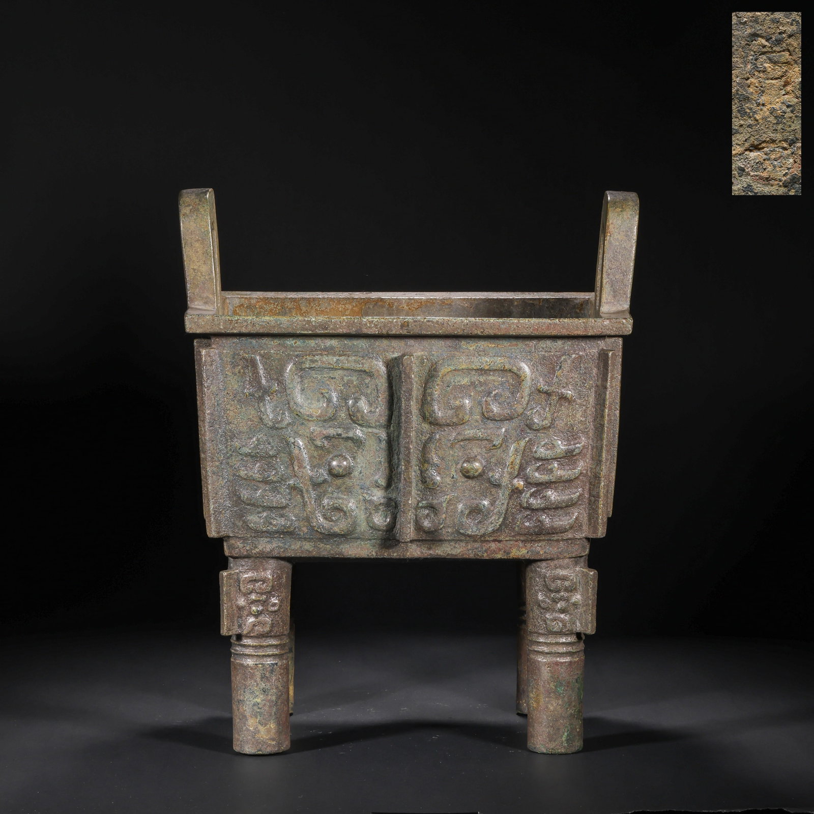 Bronze Square Vessel with Feet, with Animal Patterns. Shang Dynasty: H:34.0cm(13.39in) W:28.5cm(11.22in) Weight:8660g(19.09lb)This vessel is cast in bronze, with a square mouth, upright ears, and four feet. The body is fully decorated with exquisite animal mask pattern