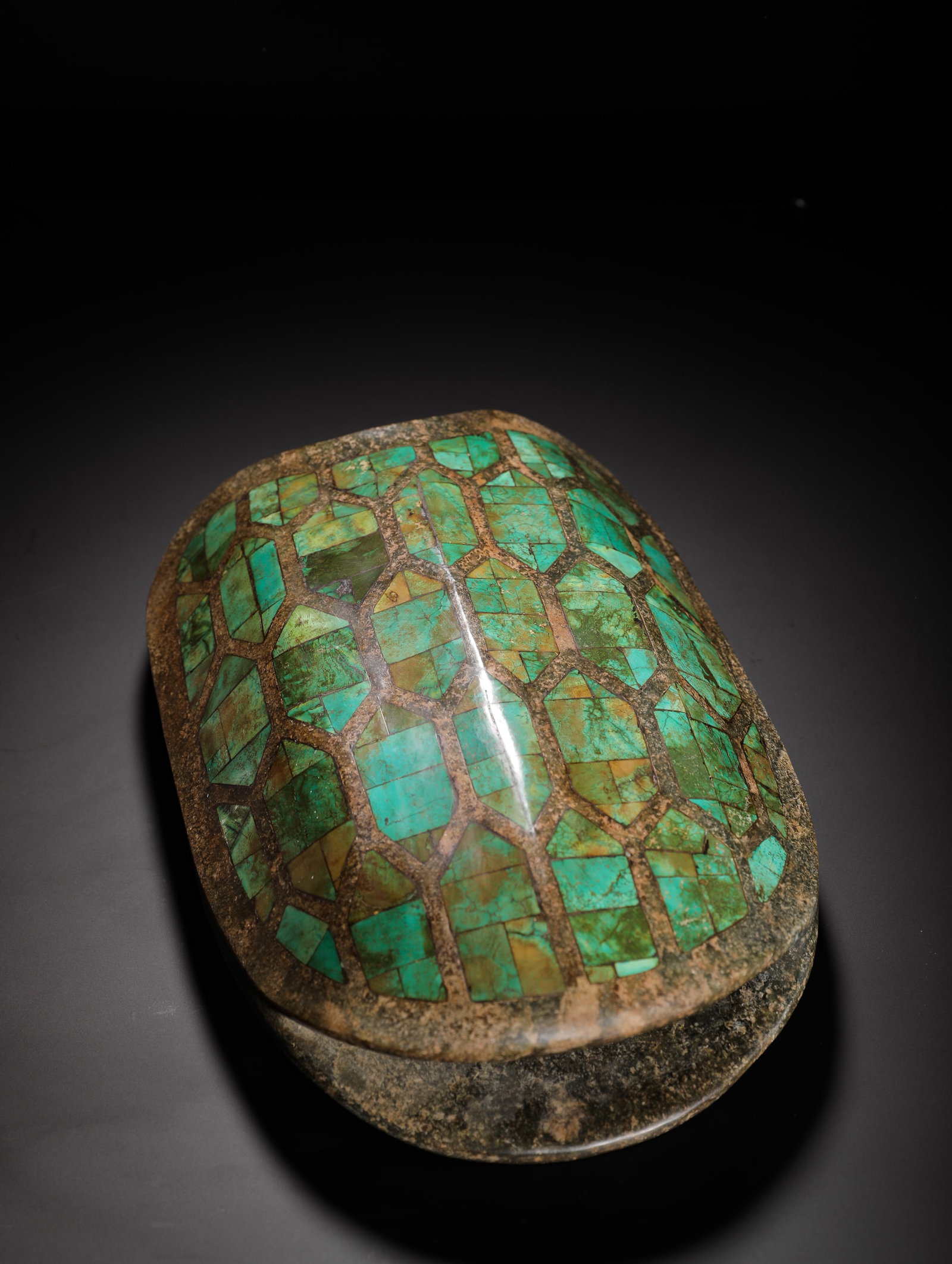Bronze Tortoise Vessel, Inlaid with Turquoise, Shang Dynasty: H:13cm (5.12in) W:30cm (11.81in) Weight:4240g (9.35lb)This is a Shang Dynasty bronze tortoise-shaped vessel, with its back inlaid with turquoise to imitate a tortoise shell. Exquisitely crafted, it wa