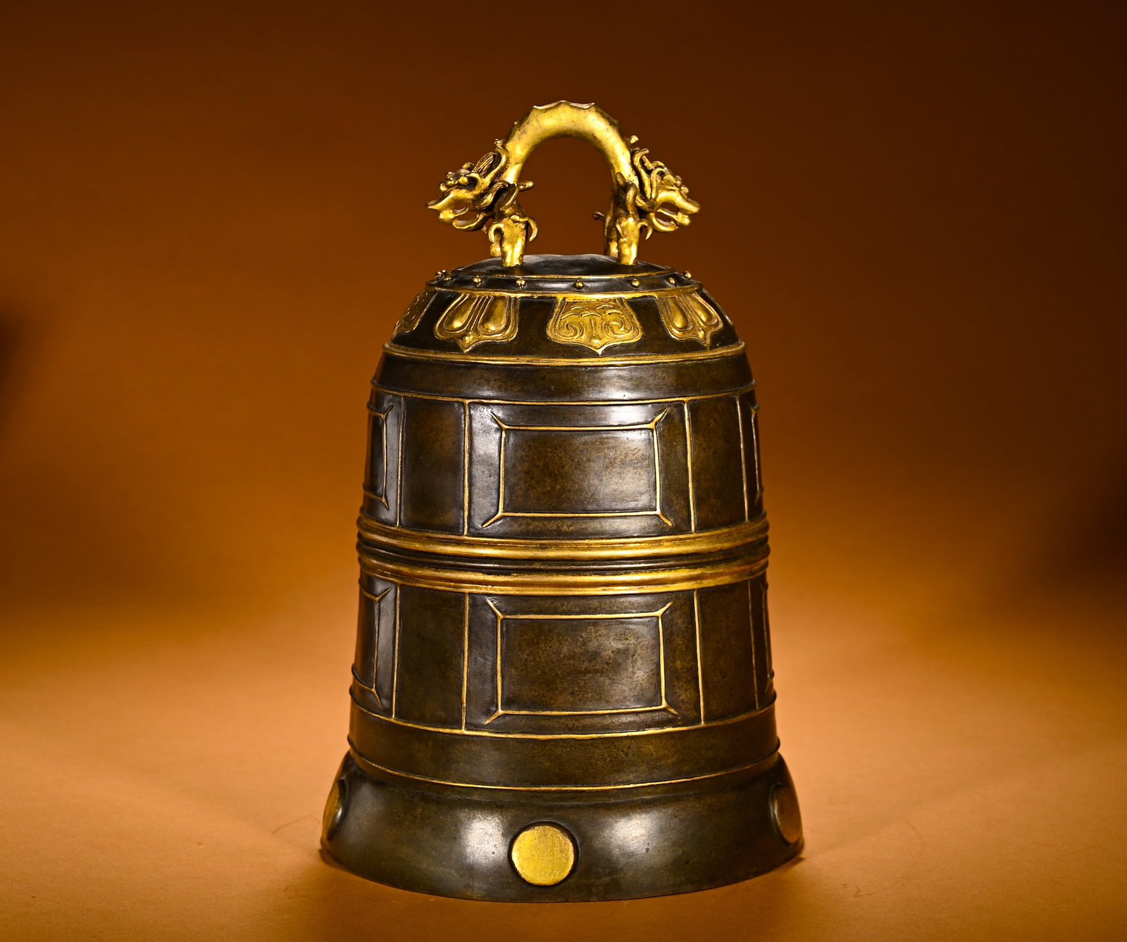 QING DYNASTY COPPER DOUBLE DRAGON BUTTON BELL WITH PARTIAL GILDING: Qing Dynasty Copper Double Dragon Button Bell with Partial Gilding, offered in fine condition.Dimensions: Width: 20cm (7.87in), Height: 30cm (11.81in), Weight: 4950g (10.91lb)Item description ? The Ea
