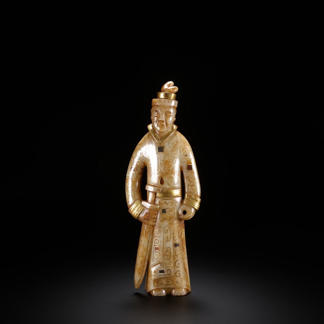 HAN DYNASTY HETIAN JADE INLAID WITH GOLD INLAID WITH A SWORD-HOLDING FIGURINE