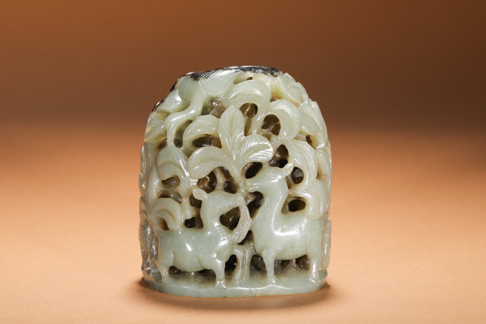 JIN DYNASTY, JADEITE FURNACE TOP FROM HETIAN: Carved celadon jade censer finial with Autumn Mountain motif, Jin-Yuan Dynasty. Crafted from smooth pale green Hetian jade with natural dark brown skin reserved on the top. Multi-layer openwork carvin