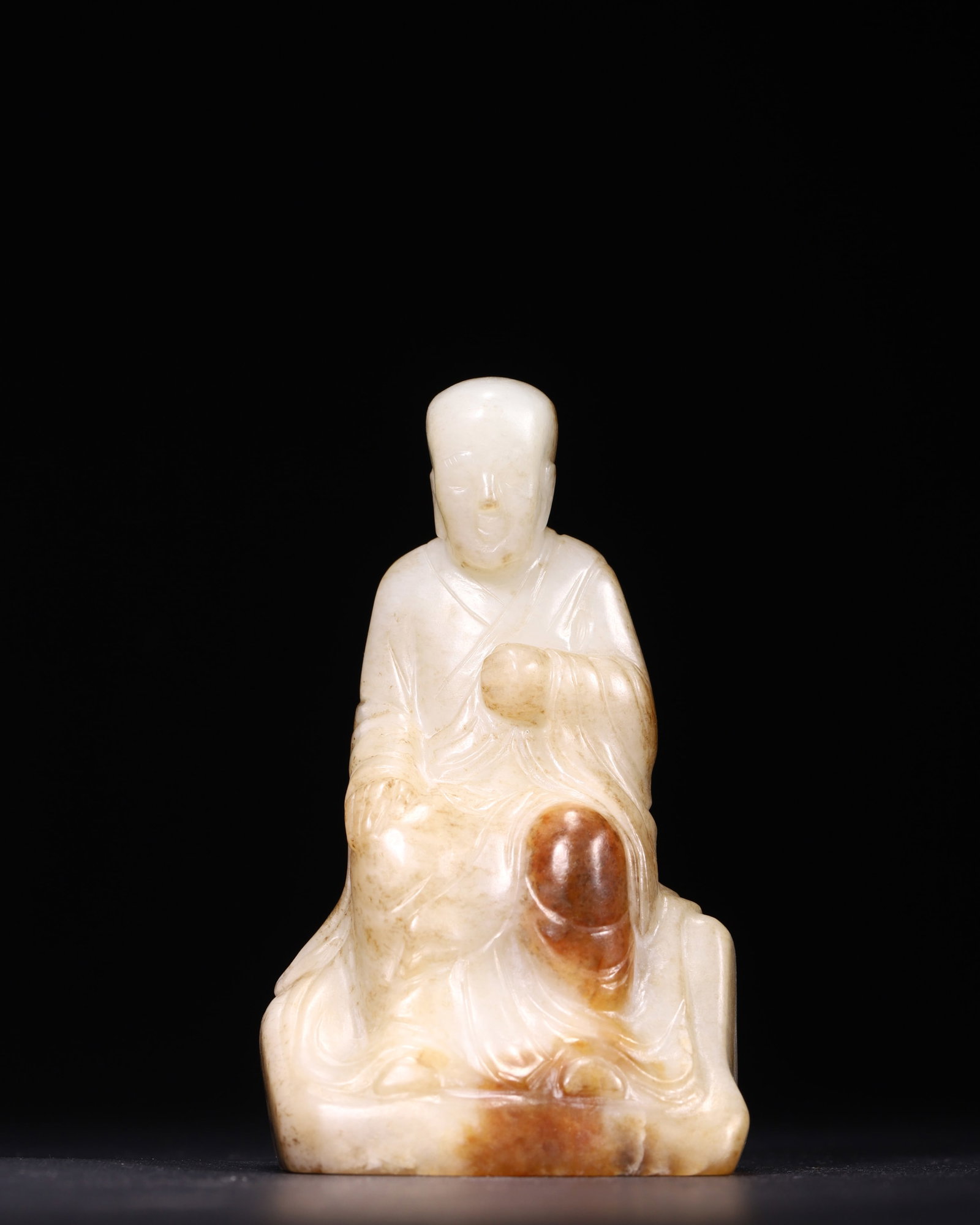Qing Dynasty, White Hetian Jade Seated Luohan Statue with Natural Russet Inclusions (1 of 8)