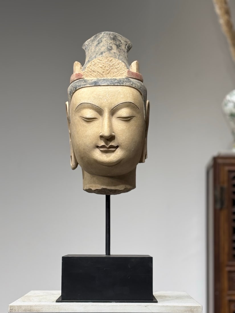 Northern Qi Dynasty, White Marble Fragmentary Bodhisattva Head: Fragmentary white marble bodhisattva head of Northern Qi, fitted with modern metal display stand. Tall three-lobed crown carved with fish-scale texture, retains original black and red mineral pigments