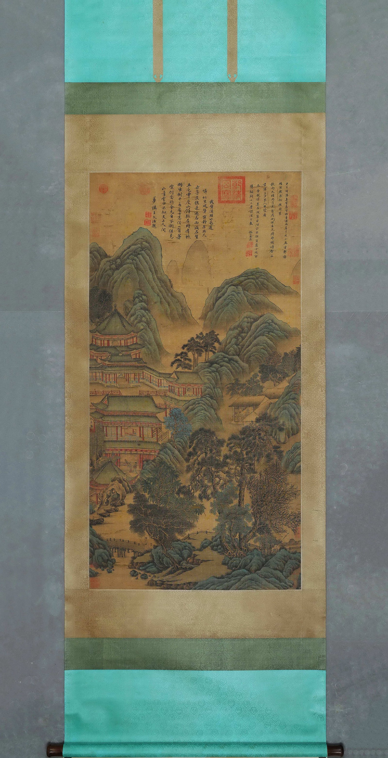 Ming Dynasty, Qiu Ying, Silk Hanging Scroll, "Immortal Pavilions in Mountains": This hanging scroll is a representative green landscape work by Qiu Ying of the Ming Dynasty, depicting immortal pavilions with elegant colors and precise architectural painting. With complete inscrip
