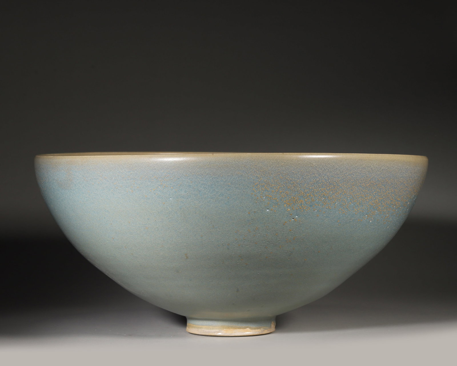 Northern Song Ru Kiln Sky-Blue Glazed Bowl: A Northern Song Ru kiln sky-blue bowl: lustrous sky-like glaze, fine crackle, natural unglazed foot. Ru kiln, top of Song porcelain, extremely rare. It embodies Song minimalism?? a pinnacle of