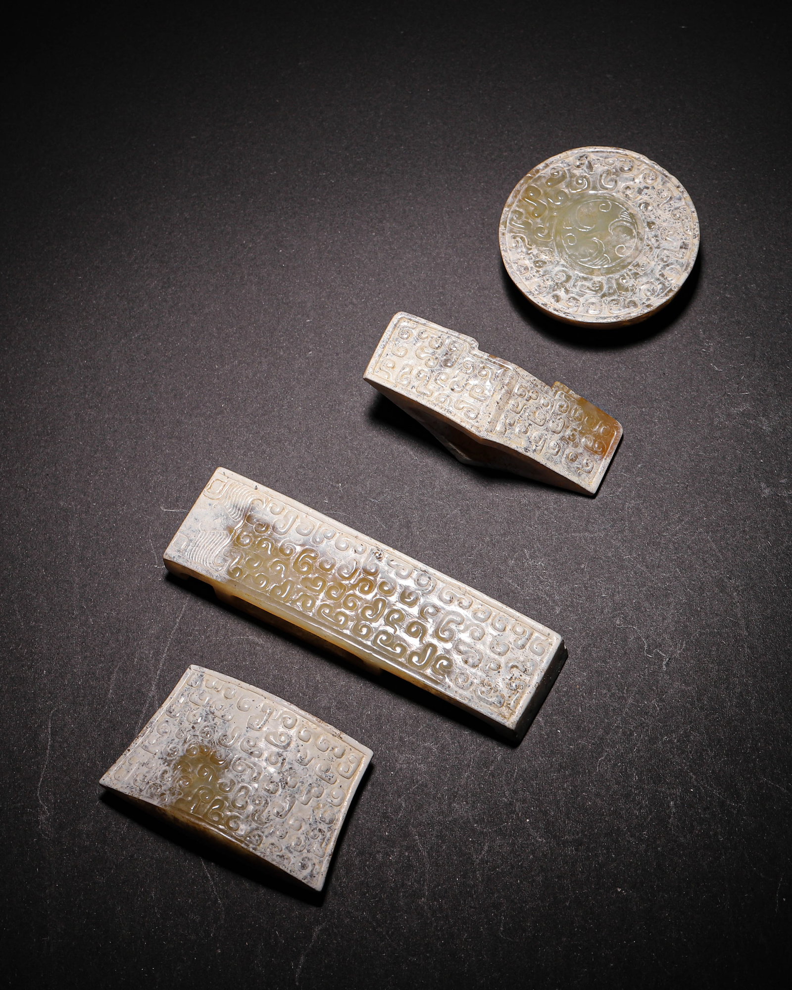 Han Dynasty (202 BC-220 AD), Set of Four Jade Sword Fittings with Cloud-Scroll Motifs (1 of 9)