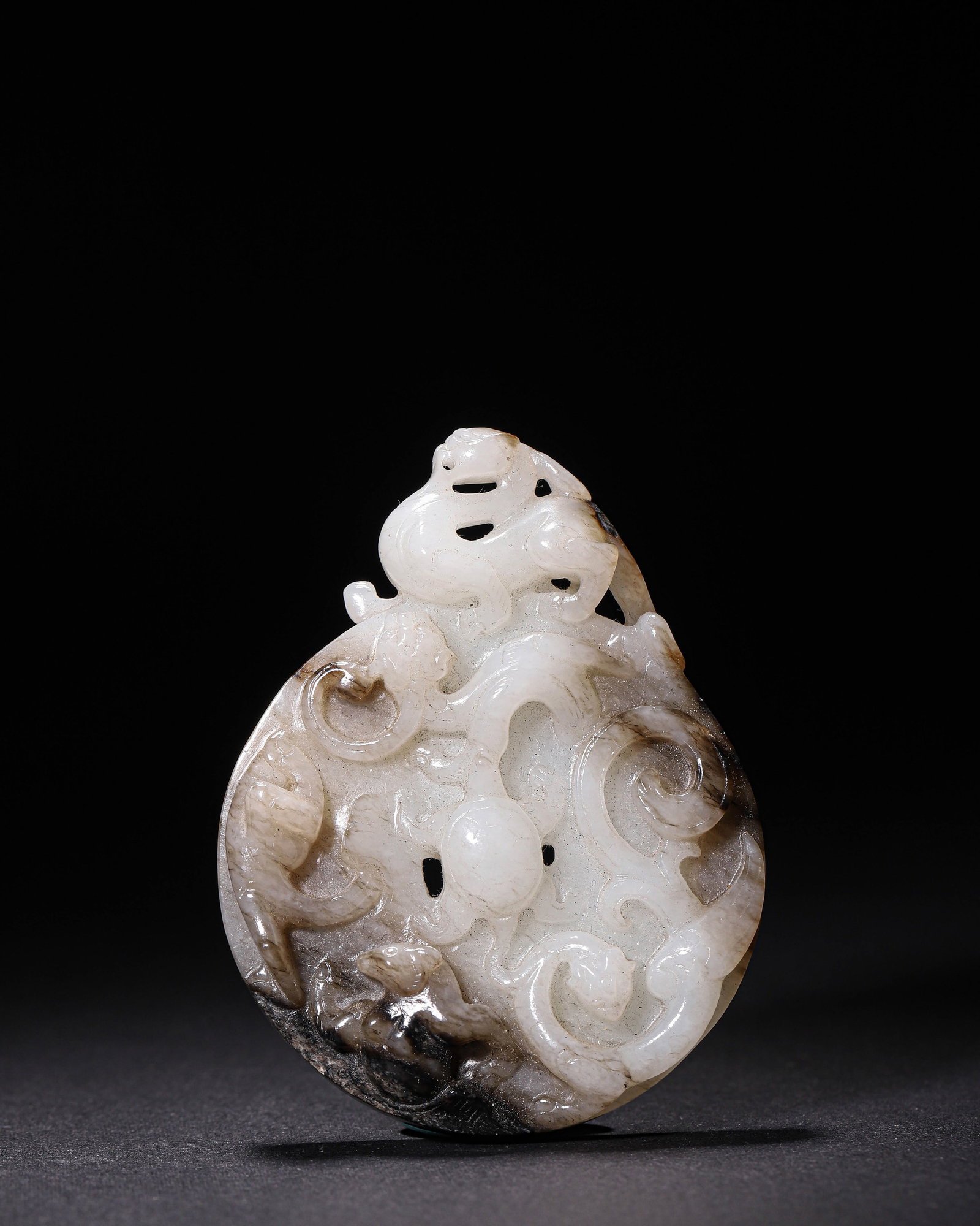 Hetian Jade Openwork Disc with Four Divine Beasts, Han Dynasty (202 BC-220 AD) (1 of 11)