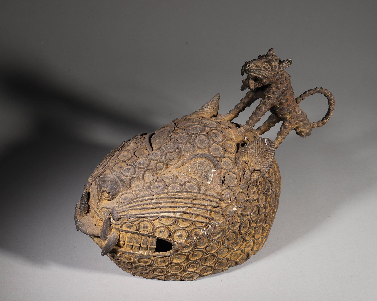 Benin Mother-and-Leopard Group 17th Century: Lost-wax-cast bronze mother-and-leopard group from the Benin Kingdom, Nigeria, date to the 17th century, displayed on palace altars to safeguard royal heirs and repel hostile forces. Leopards