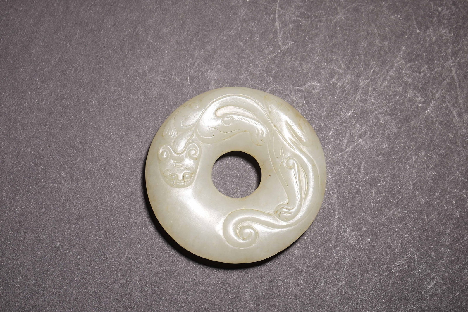 White Jade Bi with Relief Chilong, Ming Dynasty (1368 1644 CE) (1 of 6)