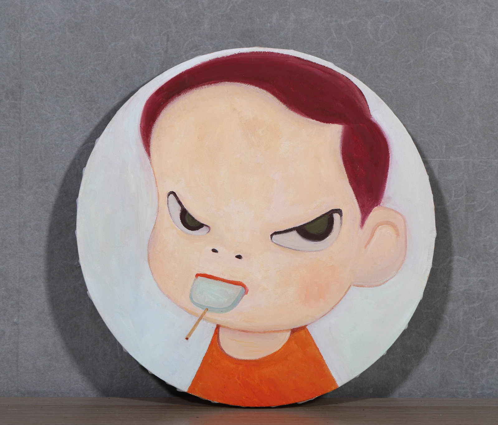 Yoshitomo Nara (Japanese, b. 1959), in the manner of, Oil on Canvas: Image:. Dimensions: Diameter: 30cm (11.81in) Item description The East is Red Auctions