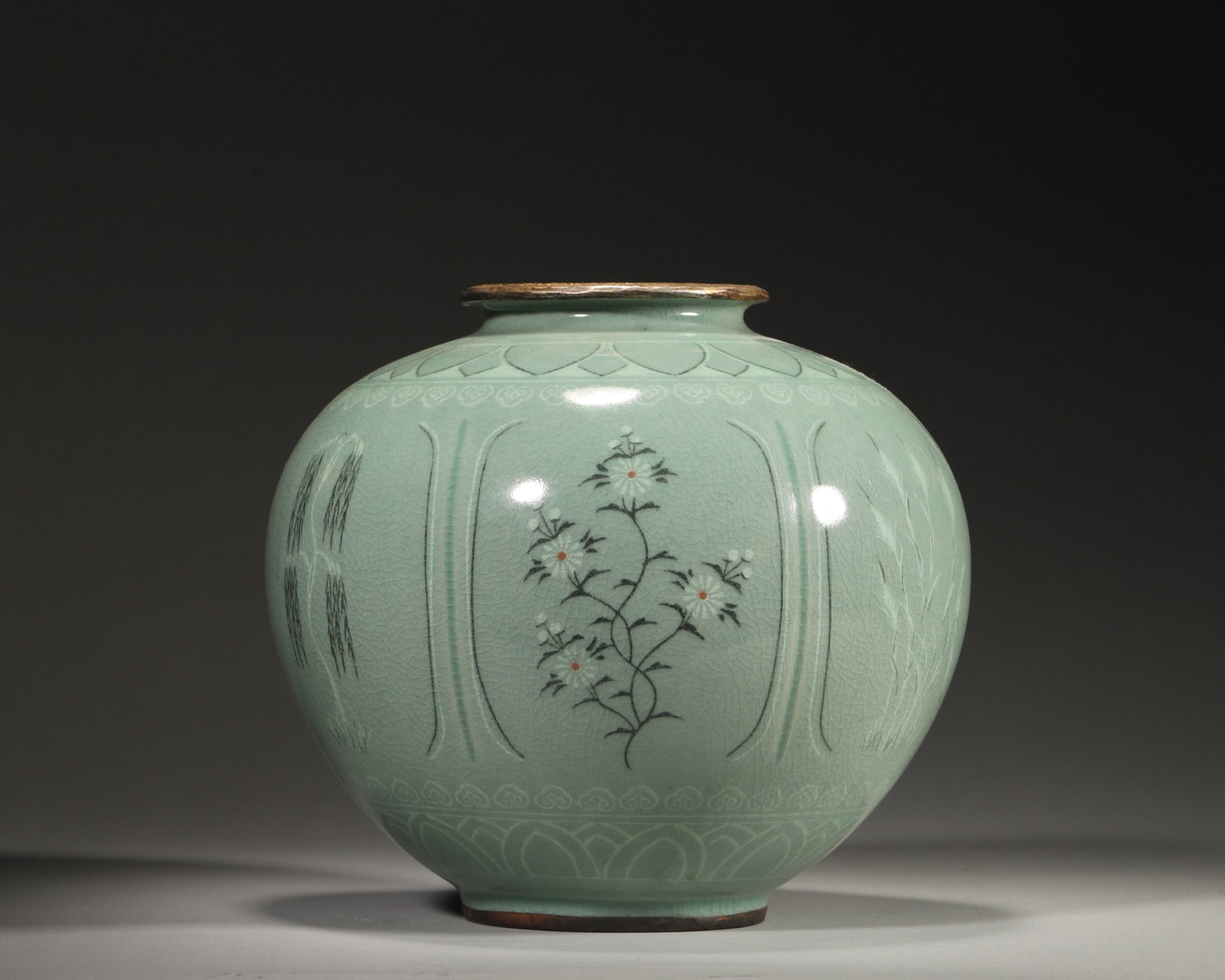 Southern Song Longquan Celadon Vase with Enamel Decor and Gilt Mounts: A Southern Song (1127-1279) Longquan celadon vase: emerald crackled glaze, willow-chrysanthemum motifs, gilt (gilded) lotus mounts on mouthfoot. It combines Longquan??s glaze beauty with enamelgilding