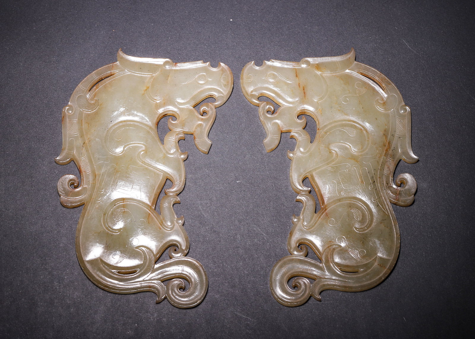 Warring States Period, A Pair of Hetian Celadon Jade Openwork Dragon Pendants (1 of 12)
