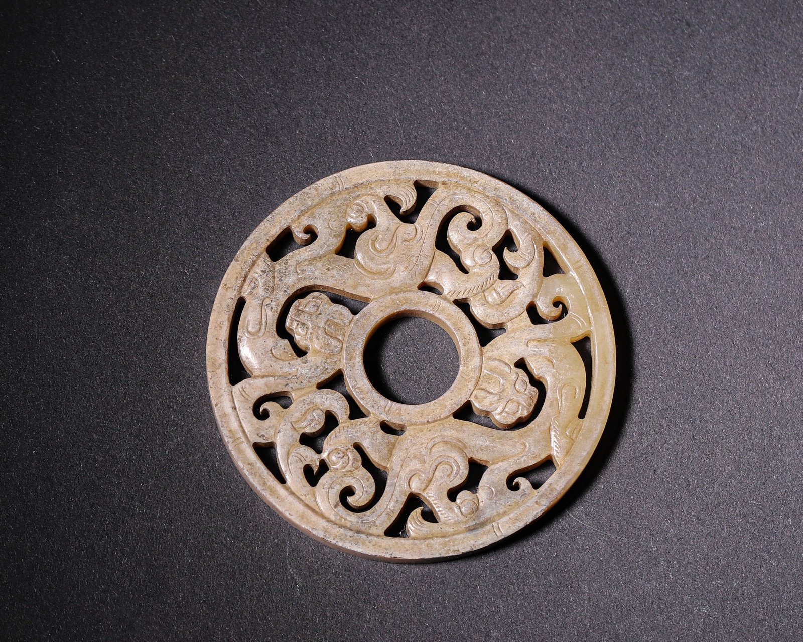 Hetian Jade Bi with Openwork Dragon and Phoenix, Han Dynasty (202 BC-220 AD) (1 of 6)