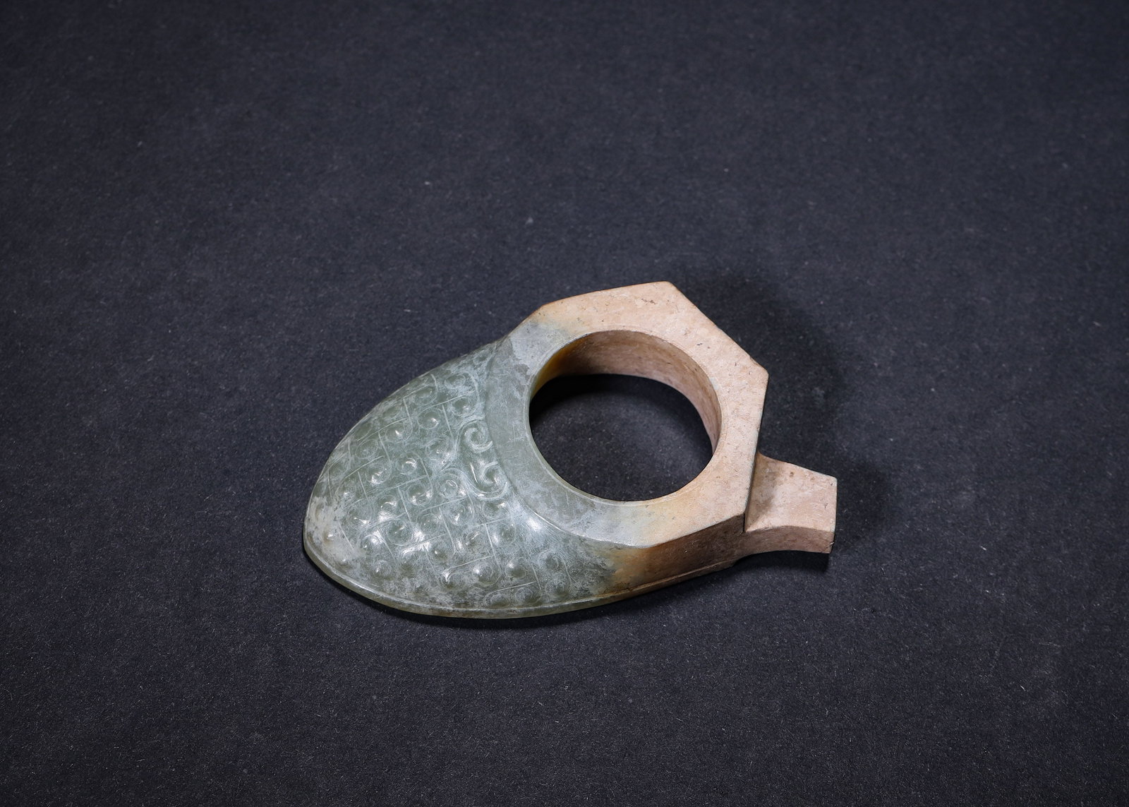 An Archaic Jade She-Shaped Pendant with Grain Pattern (1 of 7)