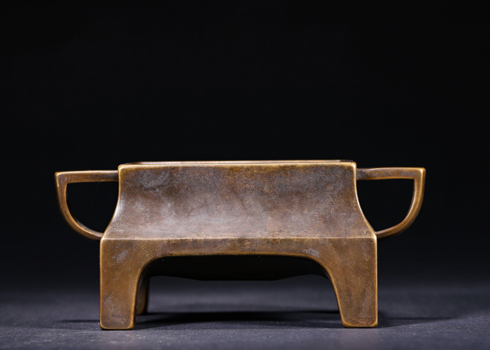 Qing Dynasty, Kangxi Period, Bronze Censer with Square Ears: A bronze censer made in Kangxi reign of Qing Dynasty. It is square with two side ears and four legs. Cast with fine copper, crisp lines, with an inscribed mark on base. Covered with natural aged patin
