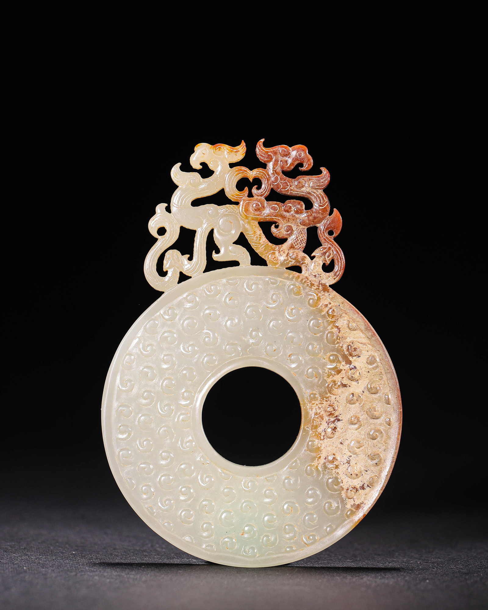 Han Dynasty, White Jade Bi with Openwork Double Dragons and Grain Pattern (1 of 7)