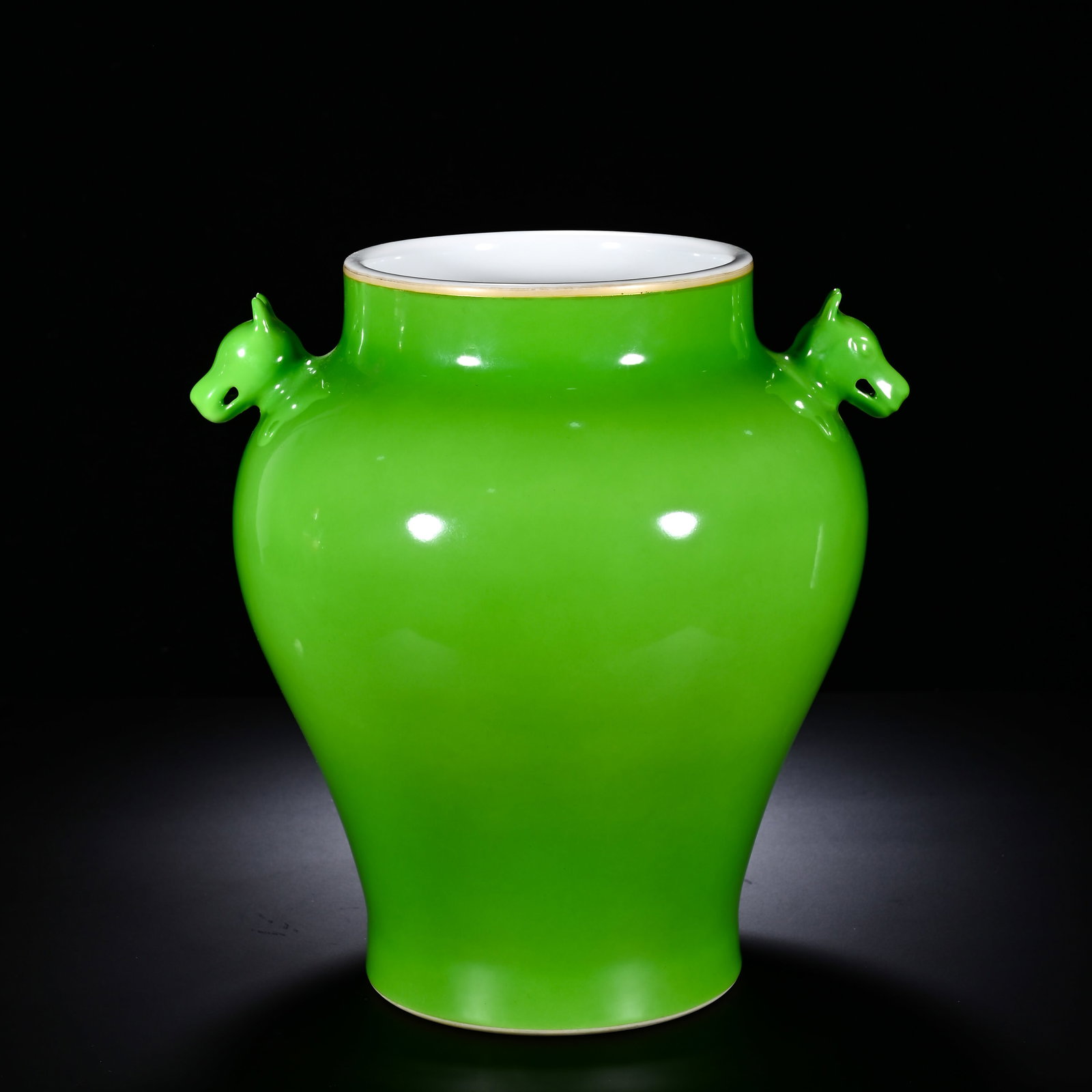 Qing Dynasty, Yongzheng Period, Apple Green Glazed Double Beast Head Ear Vase: This imposing zun vase features wide opening, short contracted neck, full rounded shoulder, swelling belly tapering toward the base and ring foot. A pair of molded beast-head handles are symmetrically