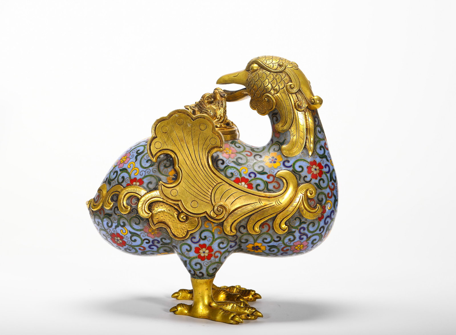 Qing Dynasty, Copper Cloisonne Enamel Sky Chicken Incense: A cloisonne enamel phoenix censer from the Qing Dynasty, shaped as a gilt phoenix with scrolling flower motifs, serving as an elegant and functional incense burner for the imperial study Dimensions: H
