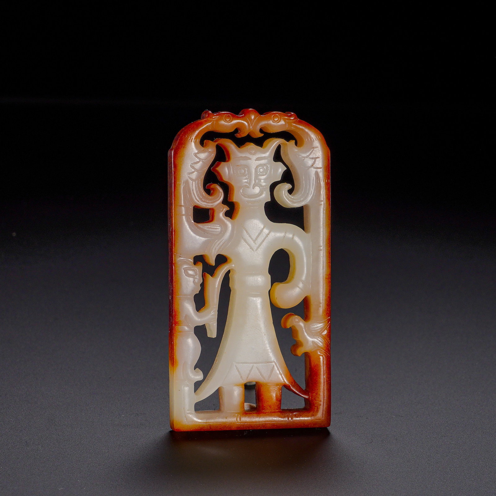 Shang and Zhou Dynasties, Dynasty Hetian Jade Pierced Engravings with Patterns of Gods, Humans and: Carved from Hetian jade, this plaque has glossy texture with rich reddish-brown patina naturally distributed along edges and mellow antique patina. It adopts rectangular shape with arched top decorate