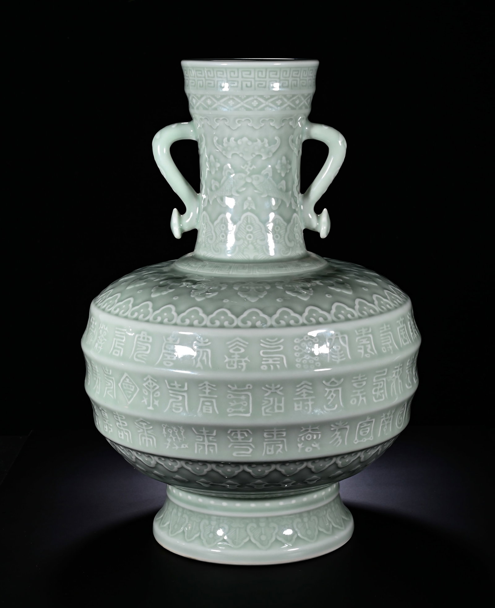 Qing Dynasty, Qianlong Bean Green Glaze Embossed Longevity Pattern Ruyi Ear Vase (1 of 7)