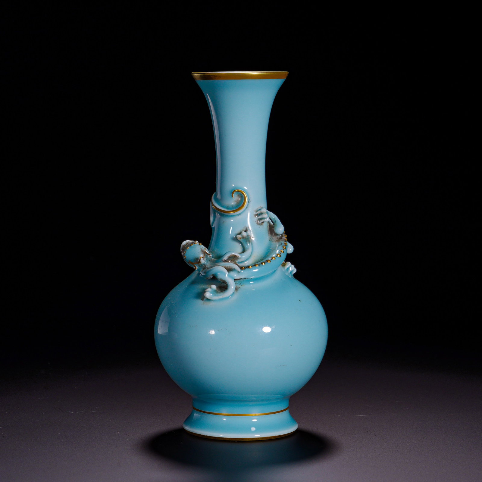 Qing Dynasty, Qianlong Sky Blue Glazed Pile Sculpture with Gilding and Chilong Patterns Long-Necked: Fine Qianlong official-ware display porcelain. Flared mouth, long neck, ovoid-globular body and splayed foot, elegant upright silhouette. Covered with smooth lustrous sky-blue glaze with soft jade-lik