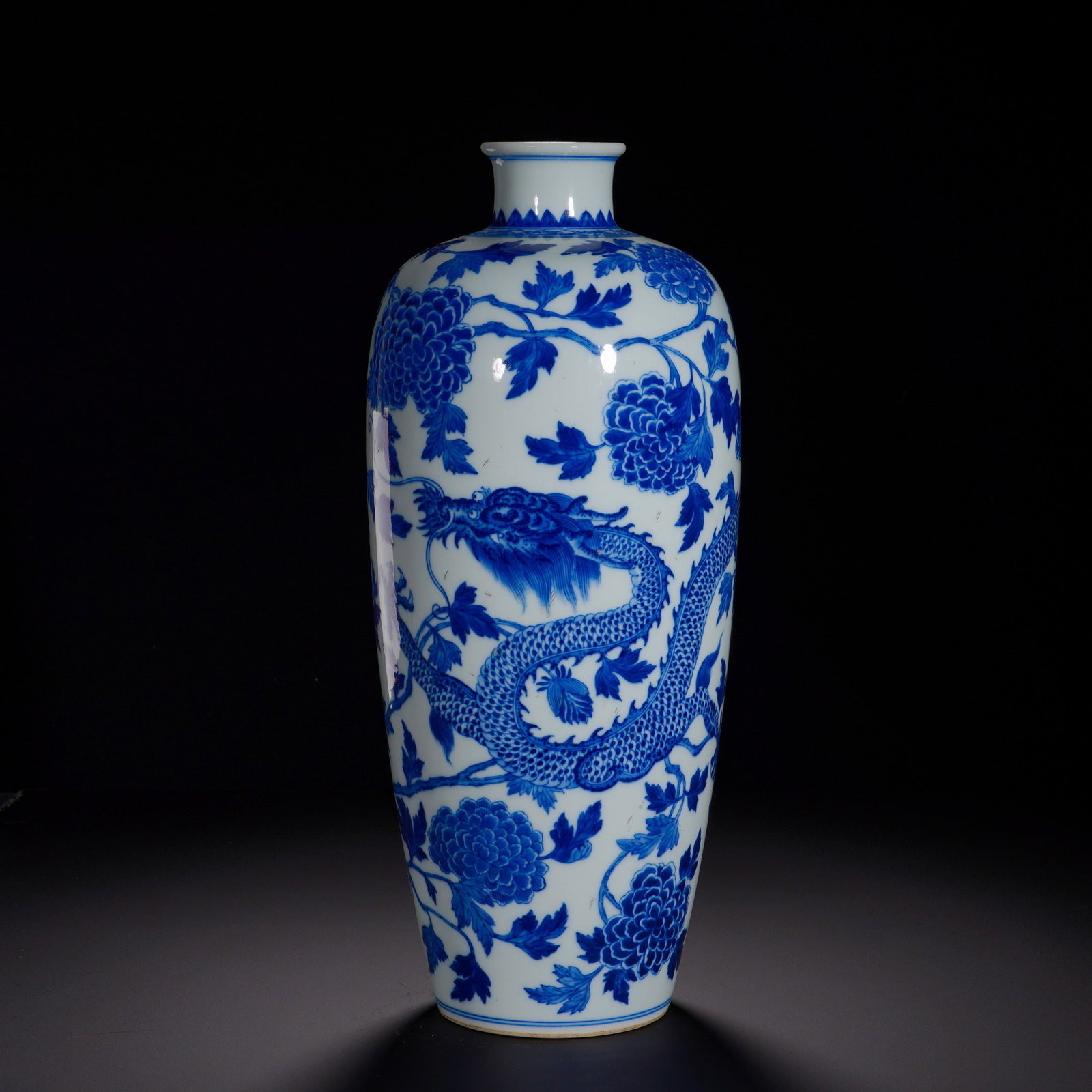 Qing Dynasty, Yongzheng Period, Blue and White Flower-Pierced Dragon Pattern Plum Vase: Classic meiping form with small short mouth, full shoulder and tapering elongated body. The vessel is covered with lustrous white glaze. Vigorous blue-and-white painting depicts a powerful dragon