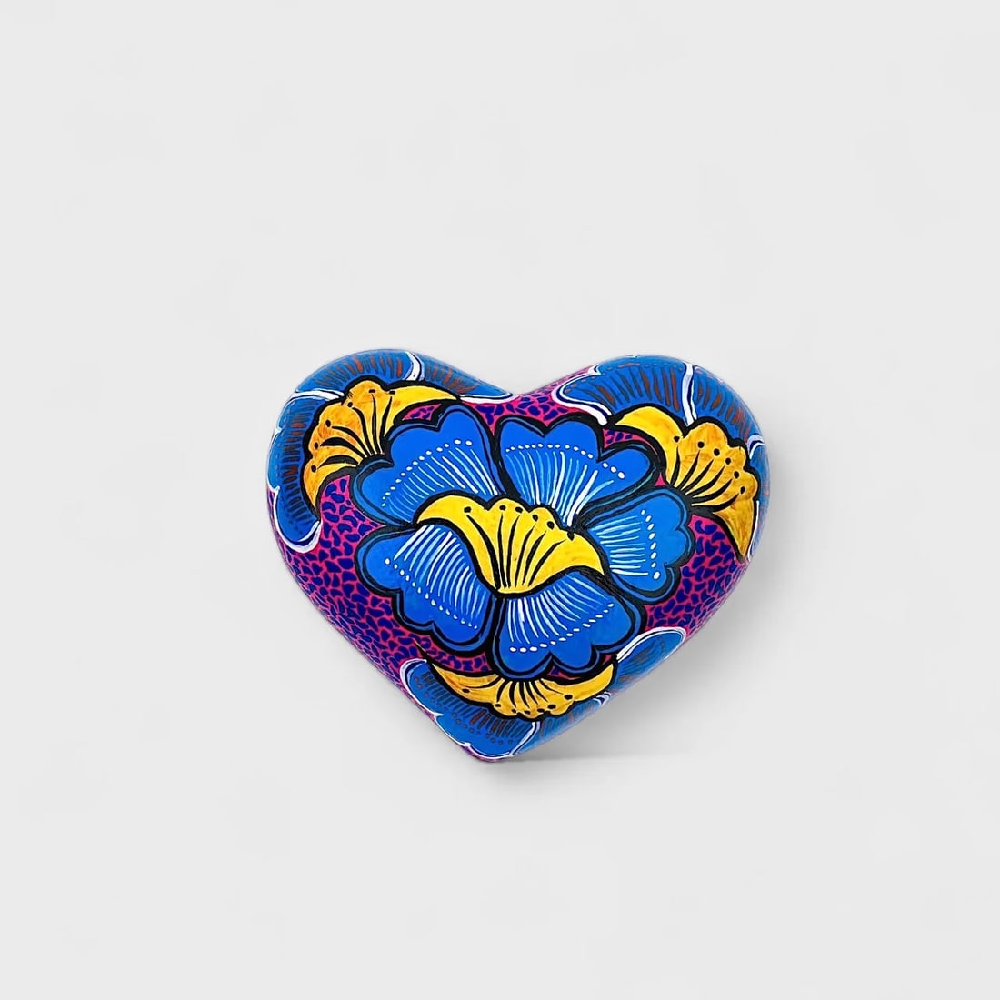"Floral in Cobalt and Gold" Clay Heart: Albertina Lopez Ramirez Floral Heart in Cobalt and Gold2.75" (h) x 6.5" (l) x 5.5" (w)2.2 lbs.Hand-molded and hand-painted clay with floral detailing. A burst of bold color and delicate florals, Flora