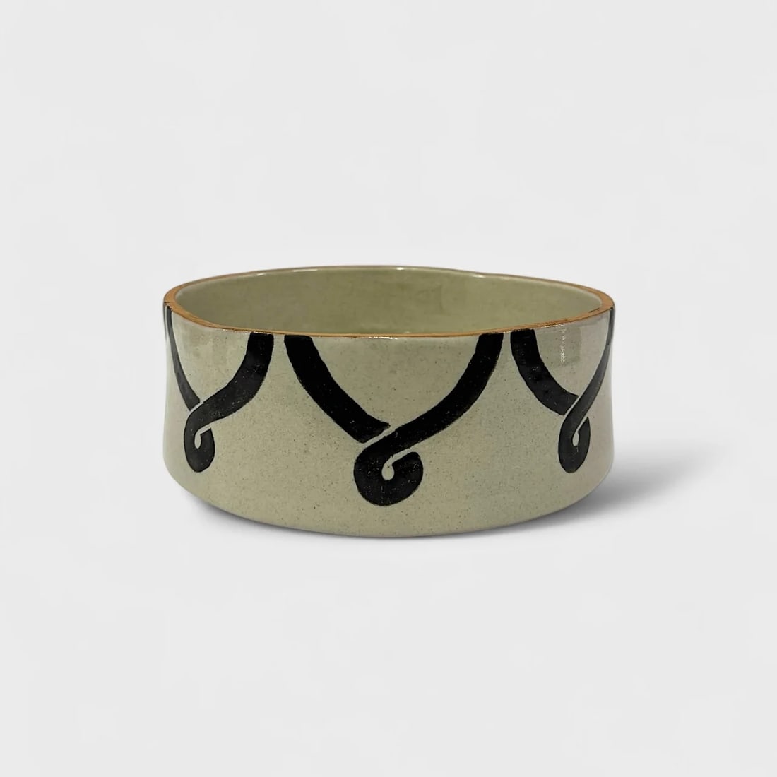 "Eternal Loop" Hand-thrown and Painted Ceramic Bowl: Talavera de la ReynaEternal Loop Bowl3.5" (h) x 10" (l) x 10" (w)3.8 lbs. Hand-thrown and hand-painted ceramic. Loop motif with woven knot base. Bold yet balanced, the Eternal Loop Bowl by Talavera