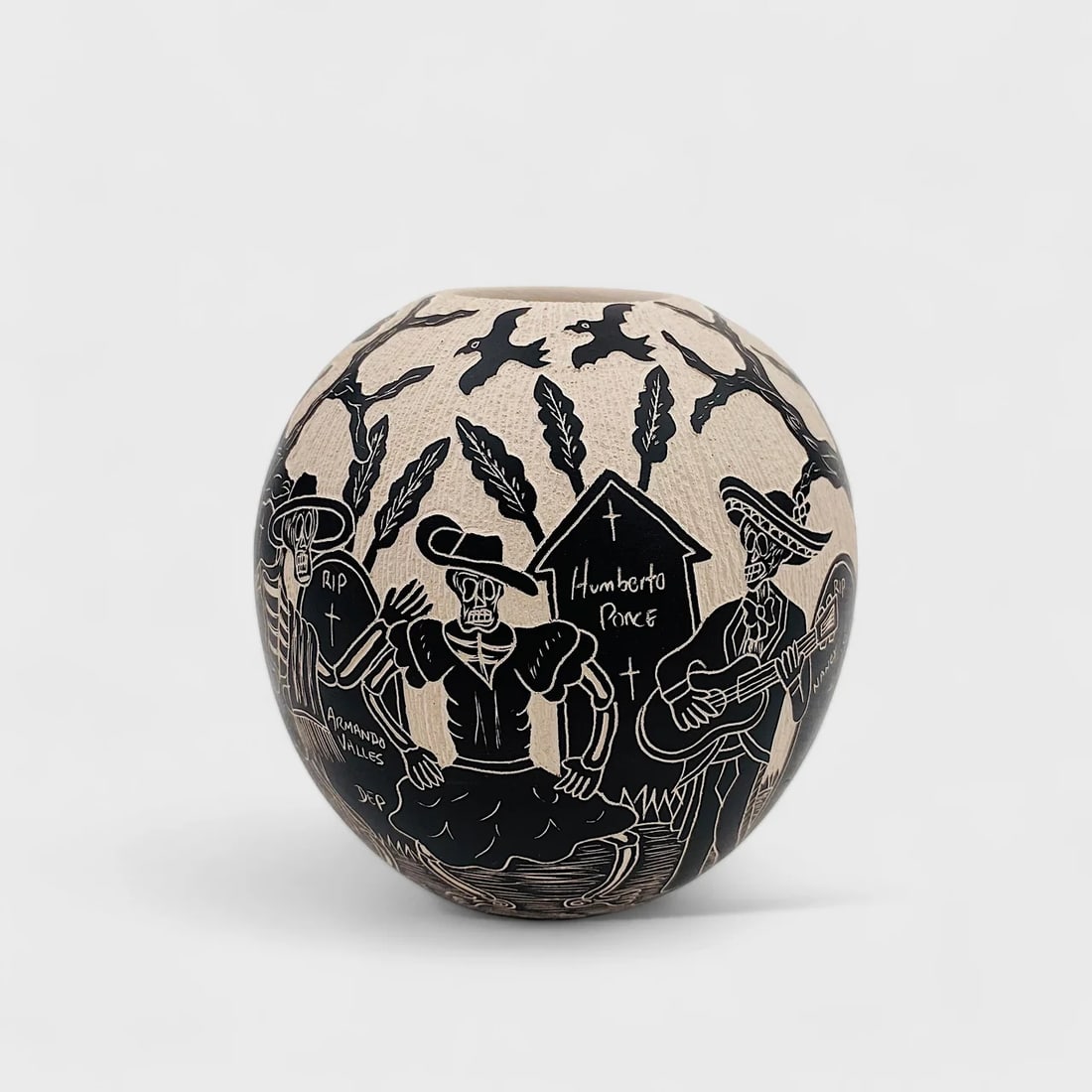 "Serenata en el Panteon" Hand-formed Cermaic Vase: Hilario Quezada Serenata en el Panteon5" (h) x 4.5" (w)1 lb. Hand-formed ceramic with etched black matte finish, sgraffito technique. Signed. Brimming with playful energy, Serenata en el Panteón (“