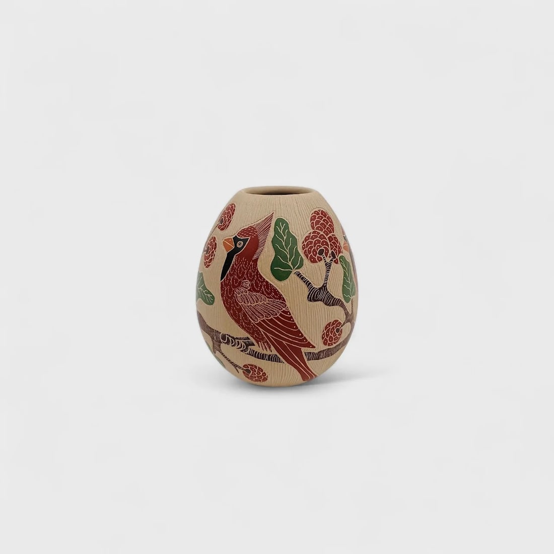 "Cardinal Bloom Vase" Hand-coiled Clay Vase: Guadalupe MendezCardinal Bloom Vase 4.25" (h) x 3.5" (w)0.5 lbs. Hand-Coiled clay, hand-etched painted with natural pigments. Signed. Cardinal Bloom Vase by Guadalupe Melendez is a delicate yet vibran