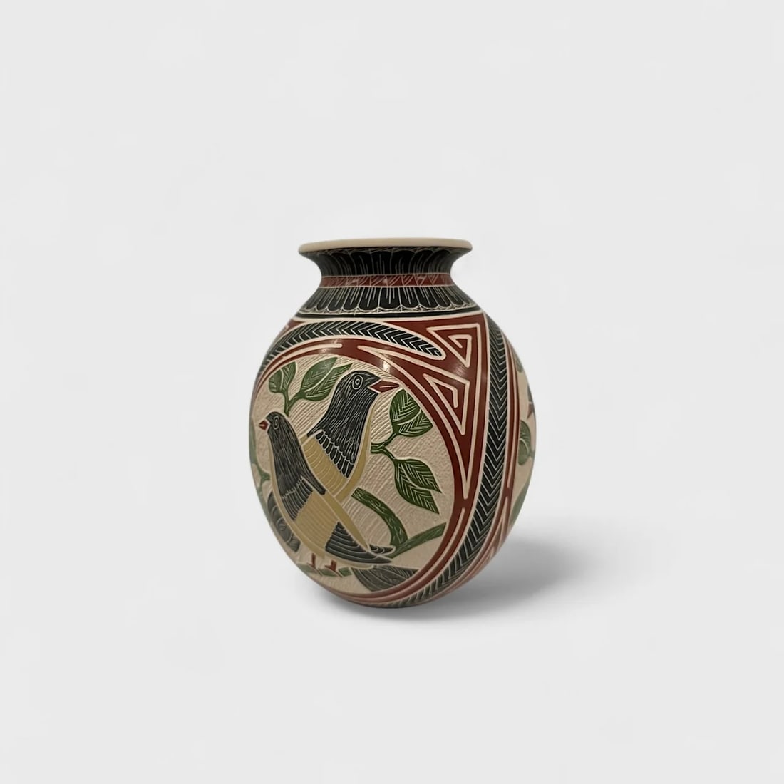 "Echoes in Clay" Hand-coiled Ceramic Vase: Hilario Quezada Echoes in Clay Vase Measurements not Specified. Weight not Specified. Hand-coiled ceramic with etched designs and geometric red and black accents. Signed. Bold lines meet natural forms