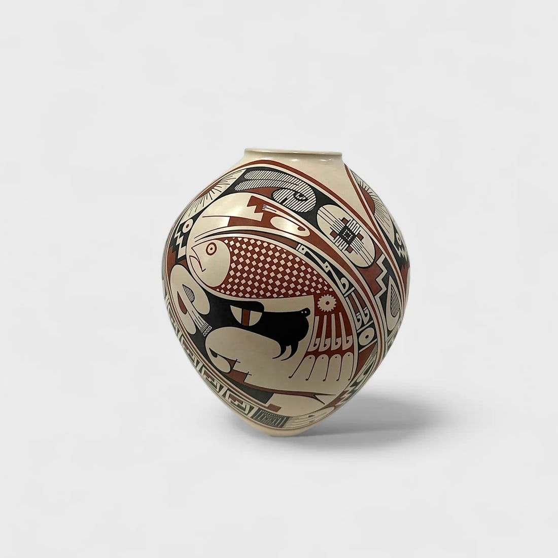 "Spirit Symbols" Hand-coiled Clay Vase: Rodrigo Perez Spirit Symbols Vessel10.5" (h) x 7.5" (w)2.4 lbs. Hand-coiled clay, hand-painted in black and red over beige, symbolic motifs. Signed. An explosion of sacred forms and ancient geometry, 