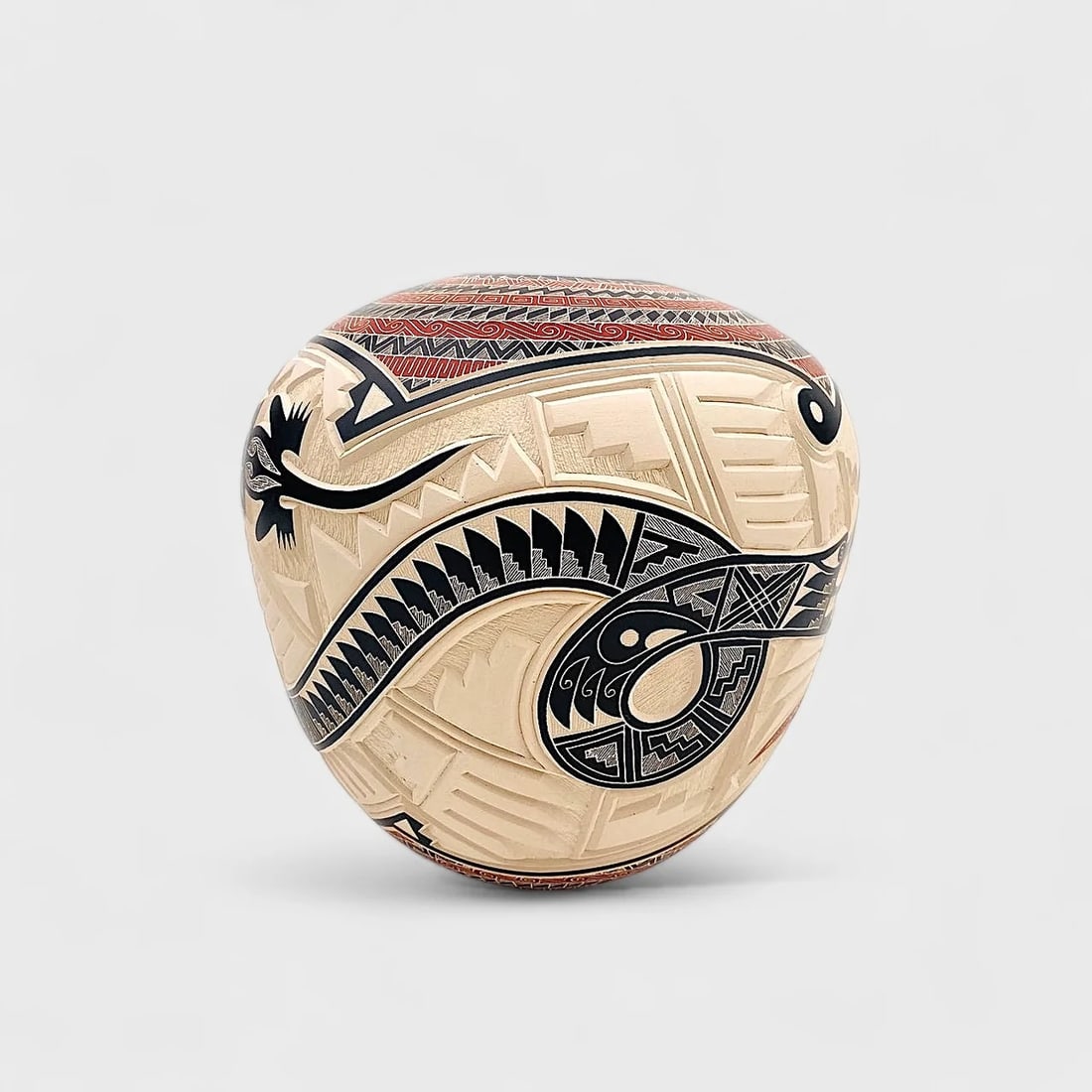 "Snake Vase" Hand-coiled Ceramic Vase: Martin Olivas Quintana Snake Vase8" (h) x 7" (w)2 lbs. Hand-coiled ceramic with engraved and hand-painted geometric designs in black and red glyph motifs. Signed. Intricate and deeply symbolic, the Sn