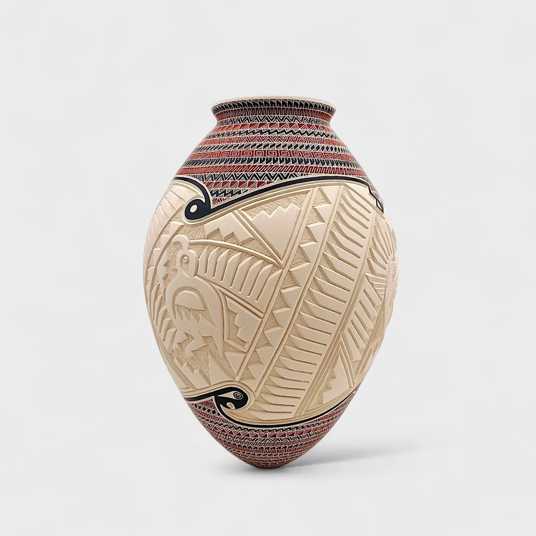 "Echoes of Mata Ortiz" Hand-coiled Ceramic Vase: Martin Olivas Quintana Echoes of Mata Ortiz 13" (h) x 9" (w)3 lbs. Hand-coiled ceramic with engraved and hand-painted geometric designs in black and red glyph motifs. Signed. Bridging ancient symbolis