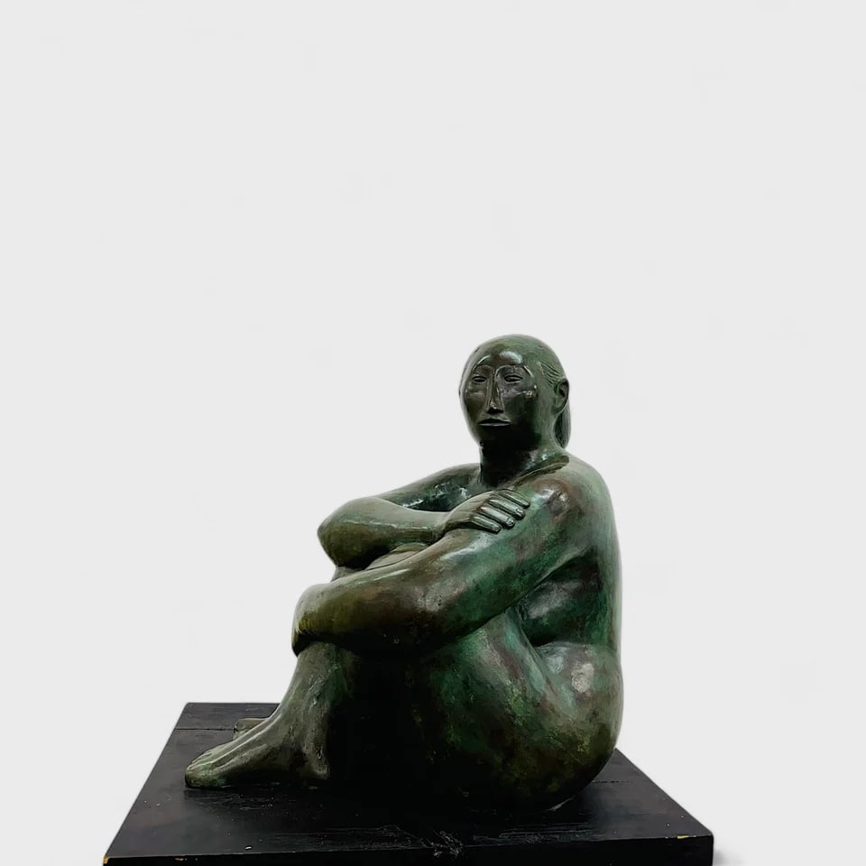 “Rooted Grace – Sitting Woman" Bronze Sculpture: Rosa Castillo Santiago "Rooted Grace"29" (h) x 30" (l) x 30" (w)Weight not Specified. Bronze sculpture with wooden base. Signed. Dated 2/16Solid yet tender, Rooted Grace is a contemplative bronze scul