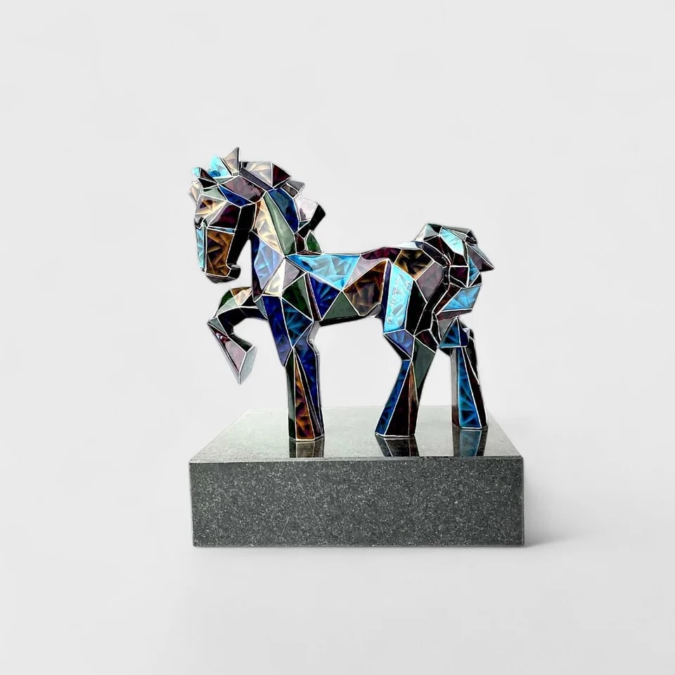 “Chromatic Stallion?? – Bronze Multicolor Geometric Horse Sculpture: Fernando Andriacci"Chromatic Stallion" - Multicolor Geometric Horse15.25" (h) x 12" (l) x 8.5" (w)28.4 lbs. Bronze sculpture with multicolor patina on marble base. Bursting with rhythm and form, Chrom